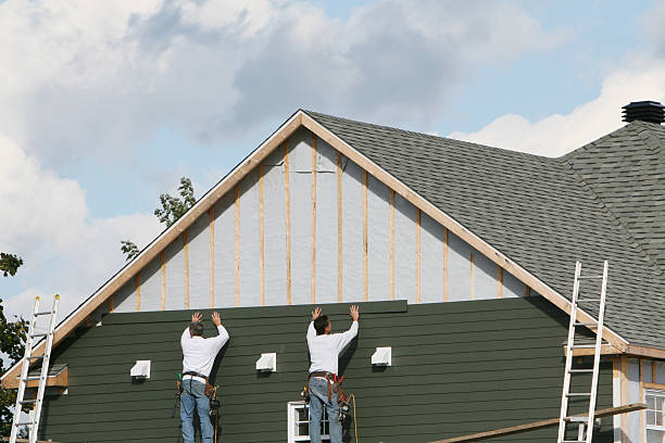 Professional Siding Replacement technician working in Creighton, PA
